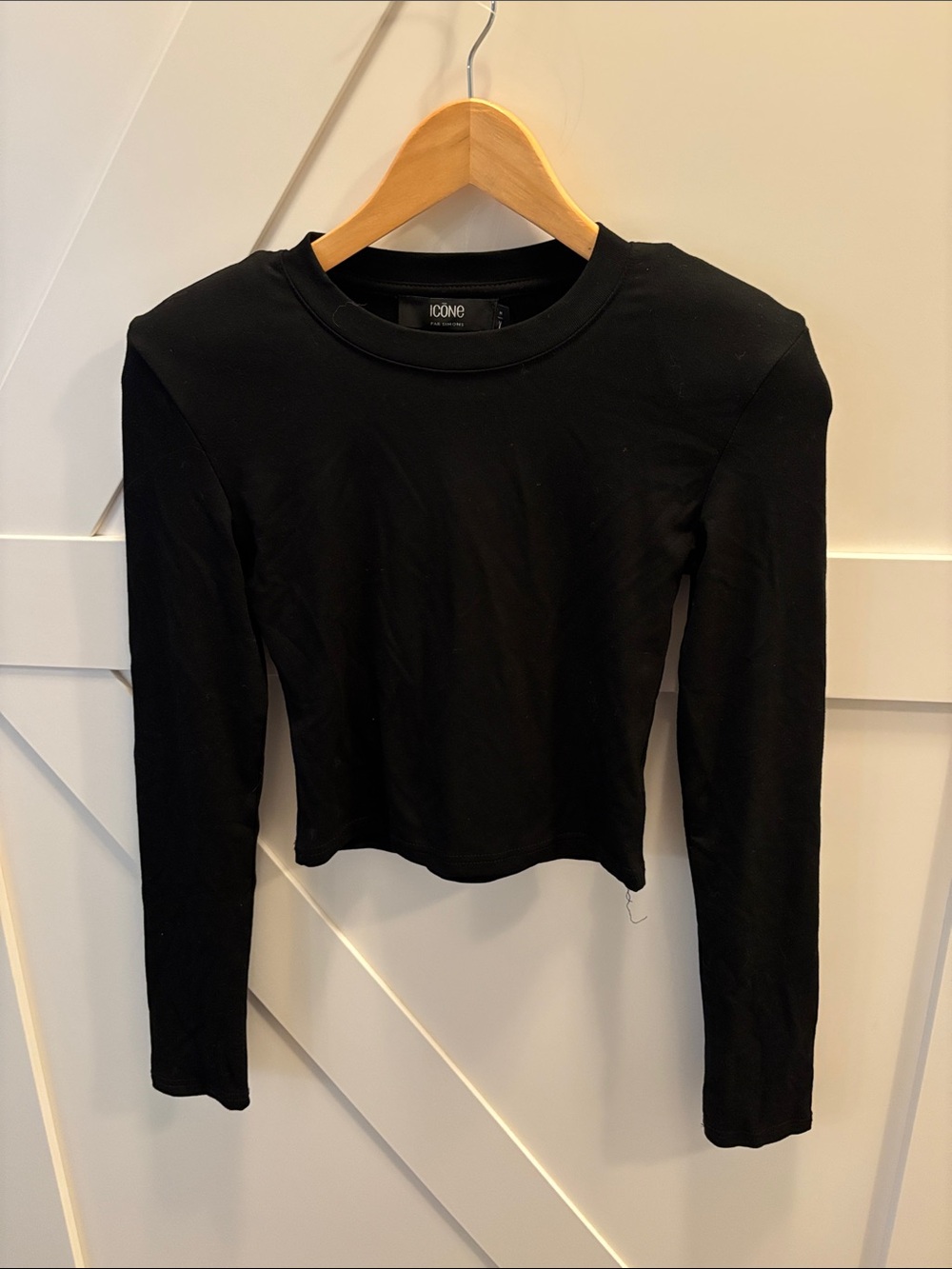 Icone Black Long-Sleeve Crop Top with shoulder pads, size M